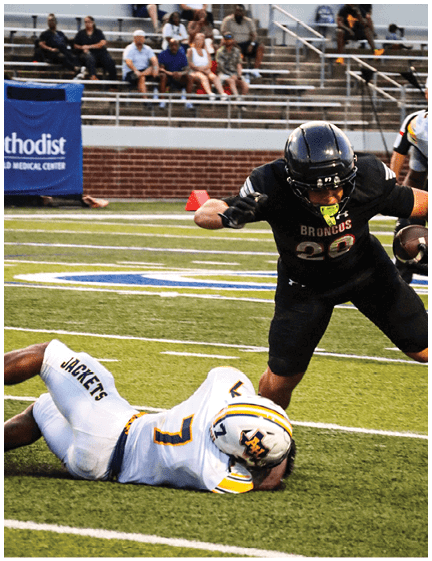 A football player wearing a blue jersey with the number 58 on it. Description generated by AI