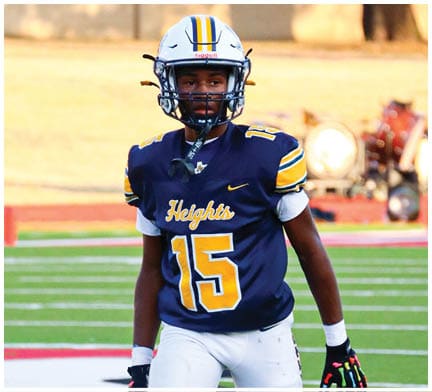 A football player running on the field. Description generated by AI