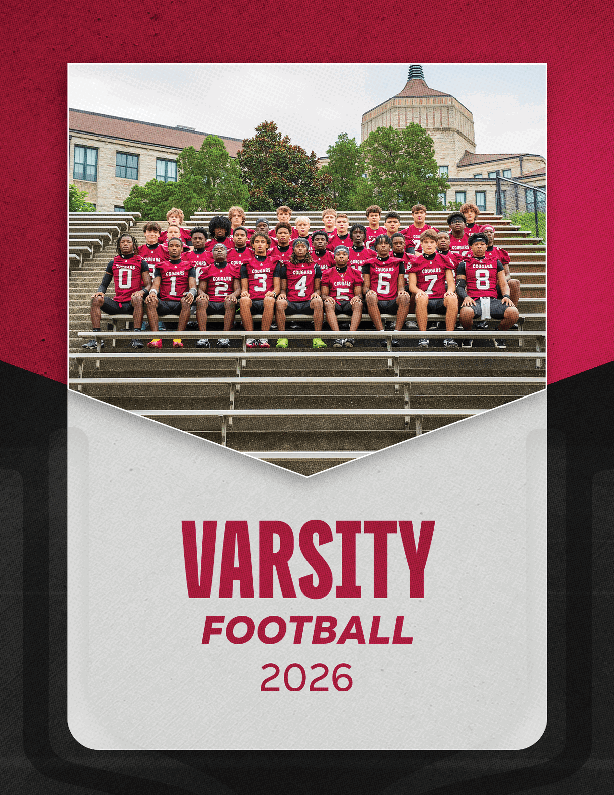 A group of football players sitting on a bench. Description generated by AI