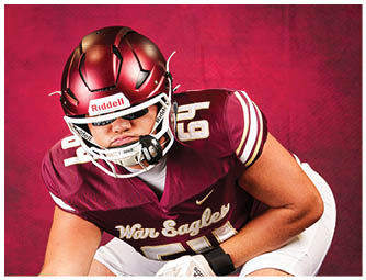 A person wearing a maroon football uniform with the number 59 and a matching helmet is crouched in a ready position against a red background. Description generated by AI