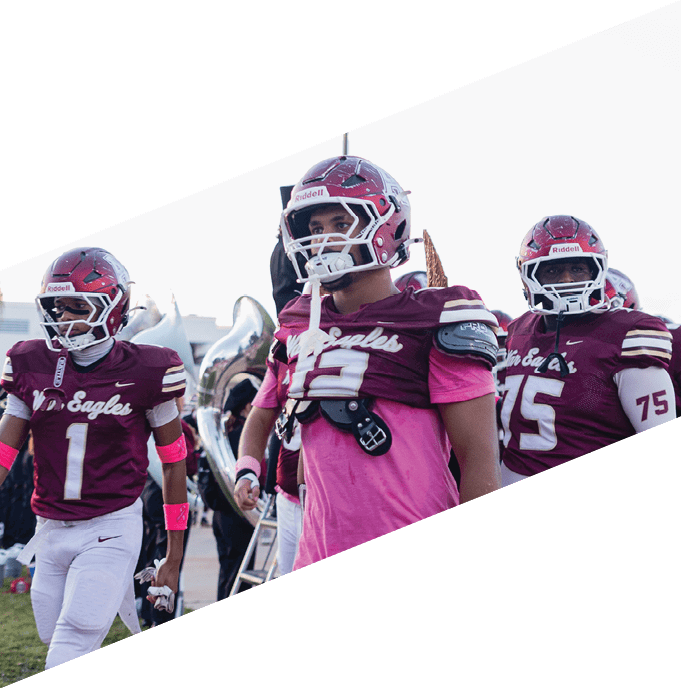 A football team is gathered around a coach, listening to his instructions. AI generated content