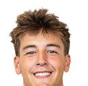 A young man wearing a white jersey with the number 10 on it. Description generated by AI