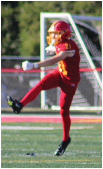 A football player catching a ball. Description generated by AI