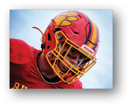 A group of football players on a field. Description generated by AI