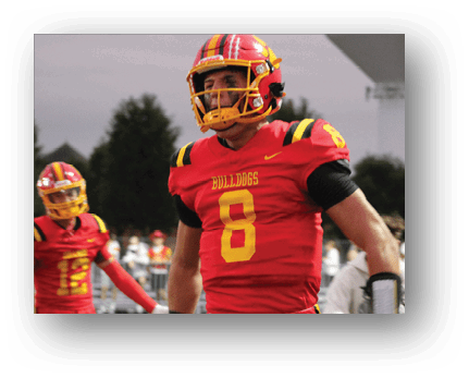 A football player running on the field. Description generated by AI