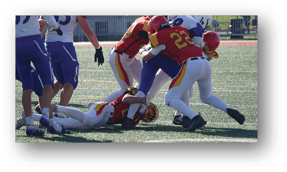 A group of football players on a field. Description generated by AI