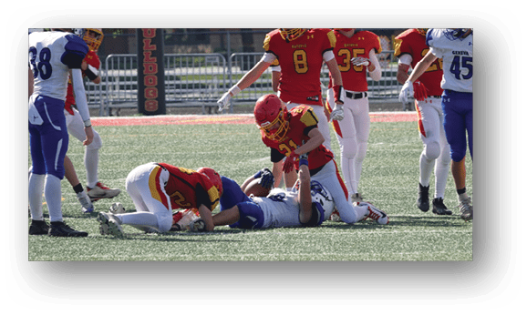 A group of football players on a field. Description generated by AI