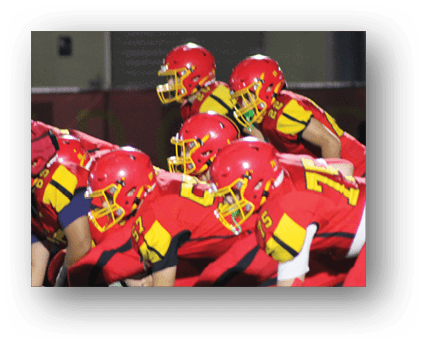 A group of football players on a field. Description generated by AI