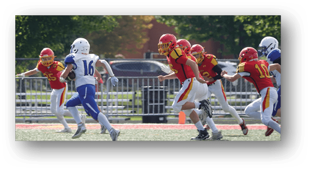 A football player wearing a blue and white uniform. Description generated by AI