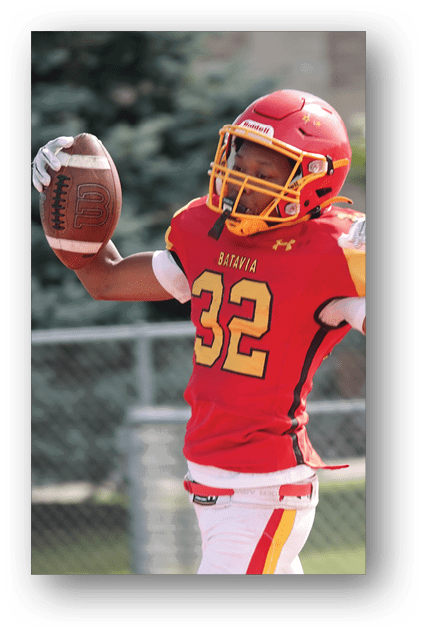 A football player catching a ball. Description generated by AI