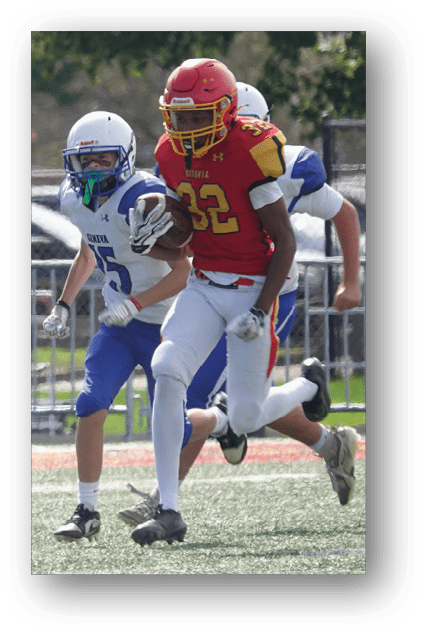 A football player catching a ball. Description generated by AI