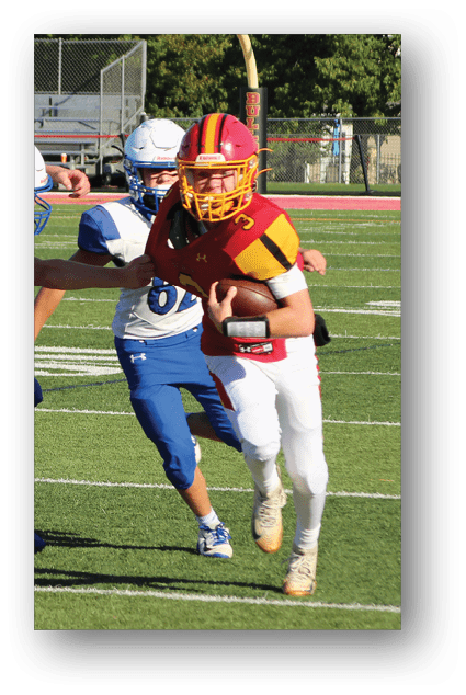 A football player catching a ball. Description generated by AI