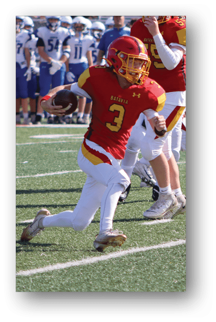 A football player catching a ball. Description generated by AI