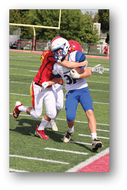 A football player catching a ball. Description generated by AI