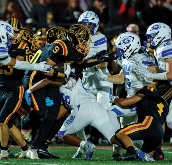 A group of football players celebrating a victory. AI generated content