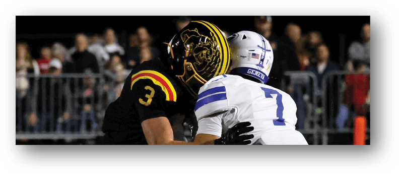 A group of football players on a field. Description generated by AI
