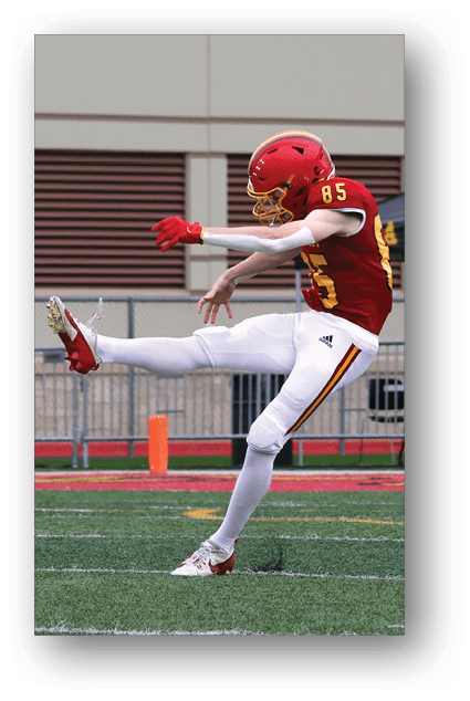 A football player catching a ball. Description generated by AI