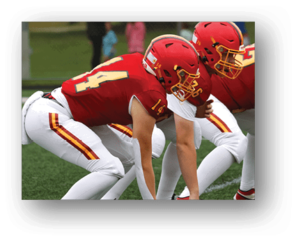 A group of football players on a field. Description generated by AI