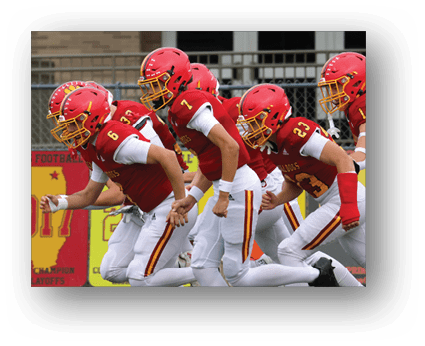 A group of football players on a field. Description generated by AI