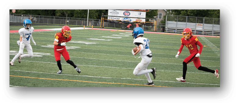 A football player wearing a blue and white uniform. Description generated by AI