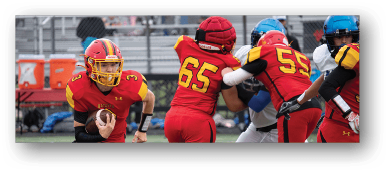 A football player wearing a blue and white uniform. Description generated by AI