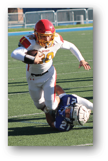 A football player catching a ball. Description generated by AI