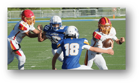 A group of football players on a field. Description generated by AI