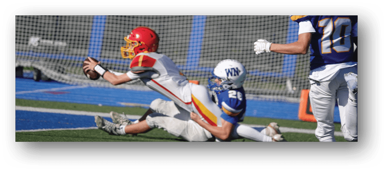 A football player wearing a blue and white uniform. Description generated by AI