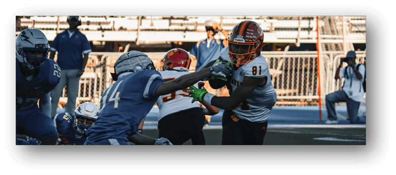 A football player wearing a blue and white uniform. Description generated by AI