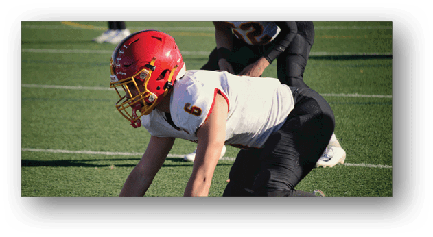 A football player wearing a blue and white uniform. Description generated by AI