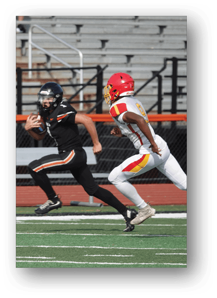 A football game is being played on a field. Description generated by AI