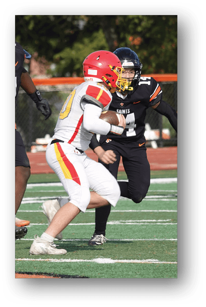 A football player catching a ball. Description generated by AI