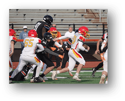A group of football players on a field. Description generated by AI