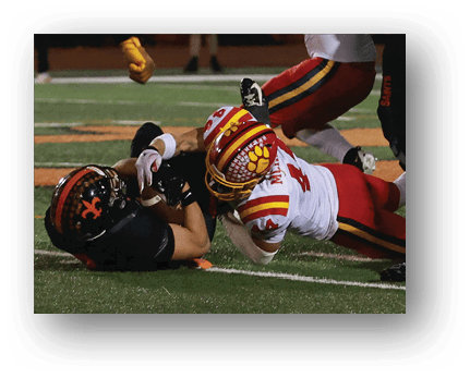 A football player running on the field. Description generated by AI
