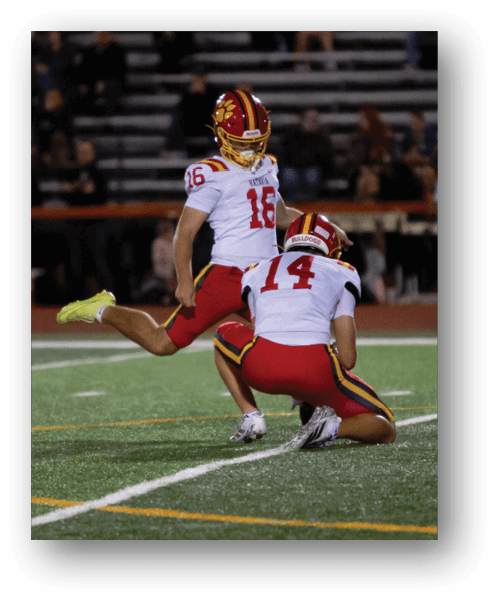 A football player catching a ball. Description generated by AI