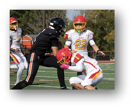 A group of football players on a field. Description generated by AI