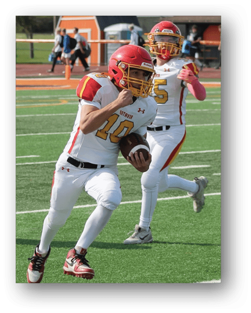 A football game is being played on a field. Description generated by AI