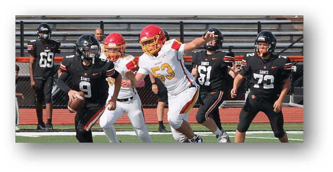 A group of football players on a field. Description generated by AI