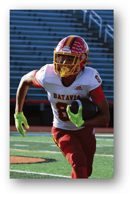 A football player catching a ball. Description generated by AI
