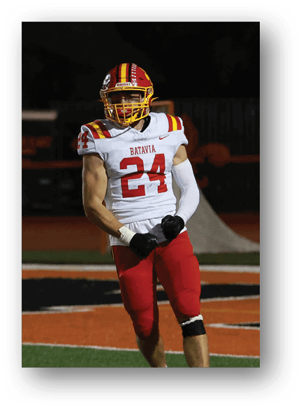 A group of football players celebrating a touchdown. Description generated by AI