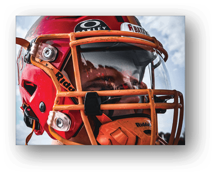 A group of football players on a field. Description generated by AI