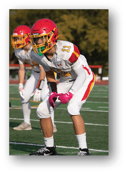 A football game is being played on a field. Description generated by AI