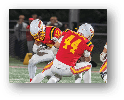 A football player running on the field. Description generated by AI