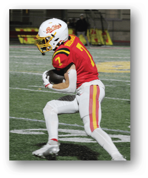 A football player catching a ball. Description generated by AI