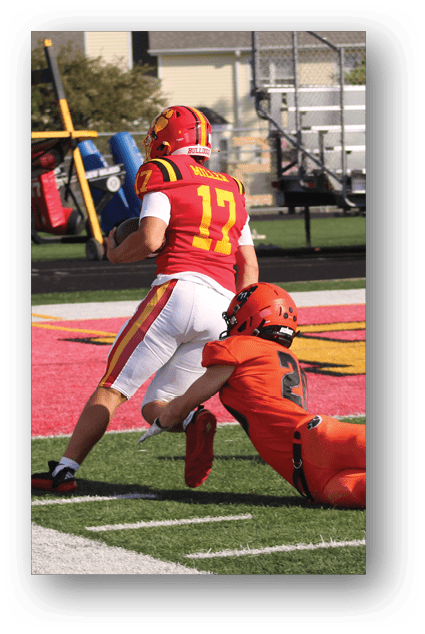 A football player catching a ball. Description generated by AI