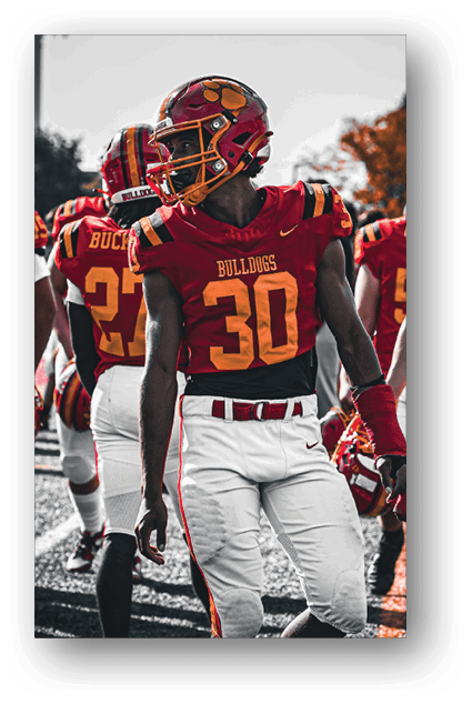A football player catching a ball. Description generated by AI