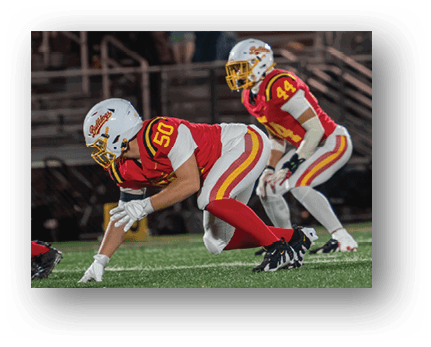 A football player running on the field. Description generated by AI