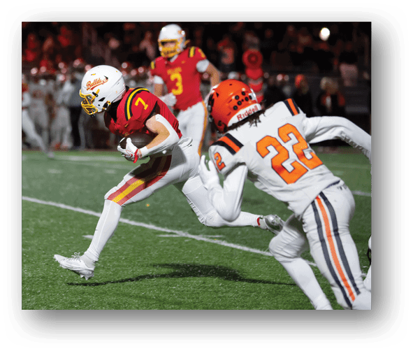 A group of football players celebrating a touchdown. Description generated by AI