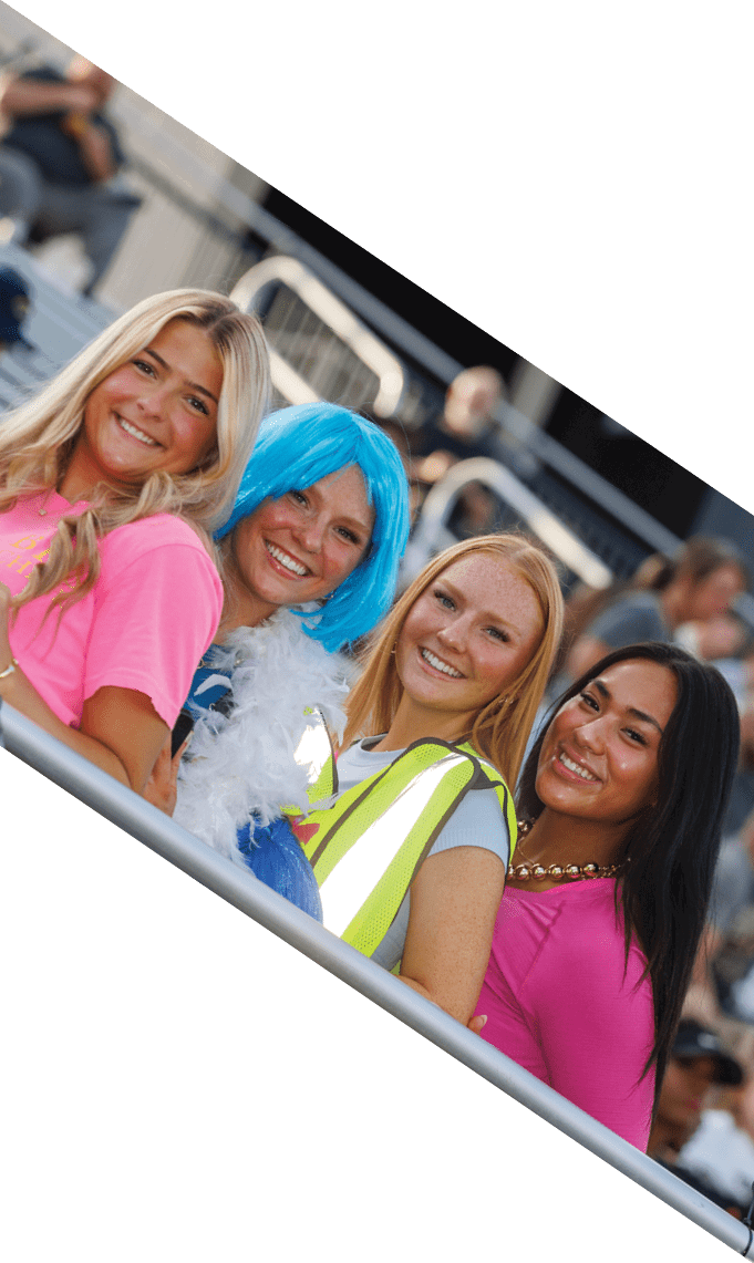 A group of football players pose for a picture. AI generated content