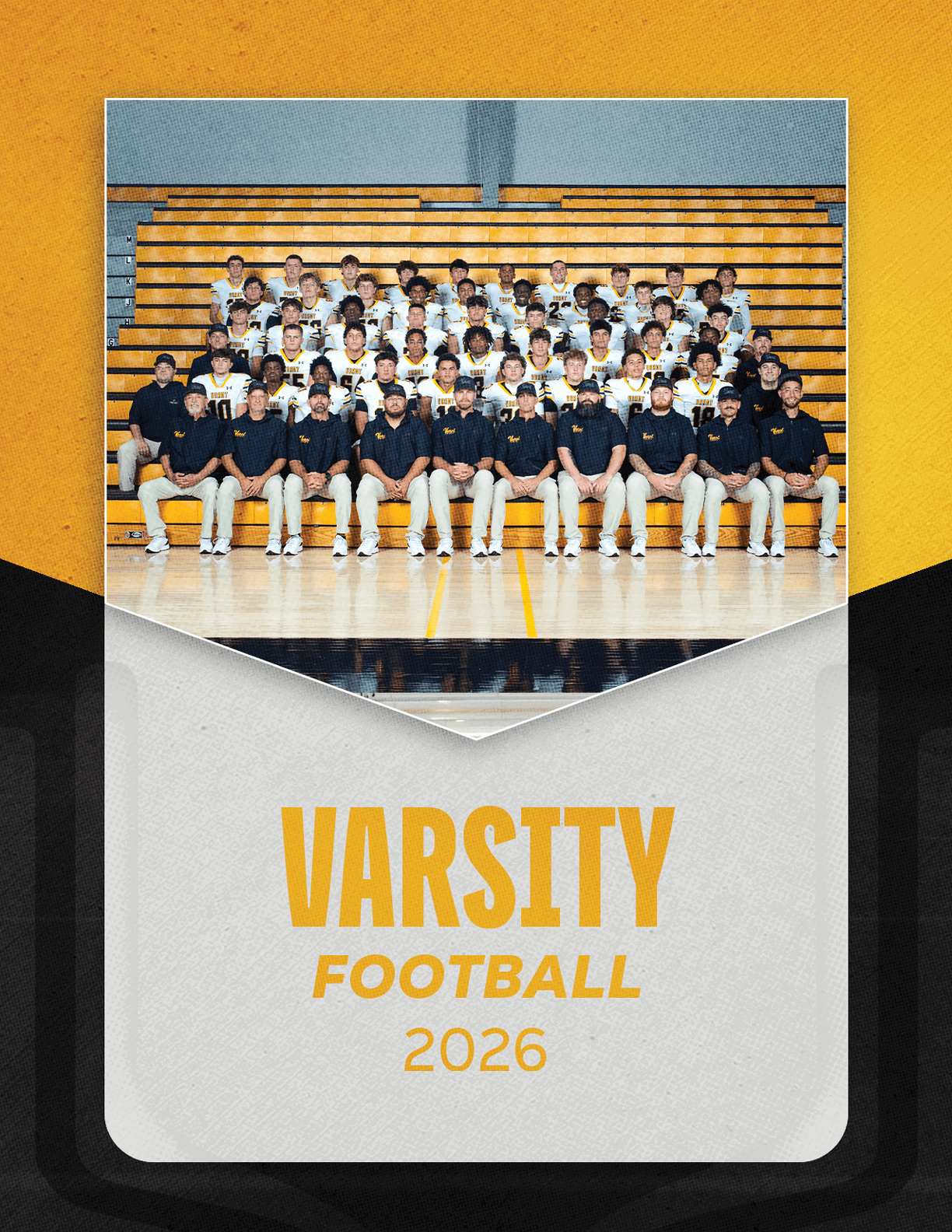 A group of football players sitting on a bench. Description generated by AI